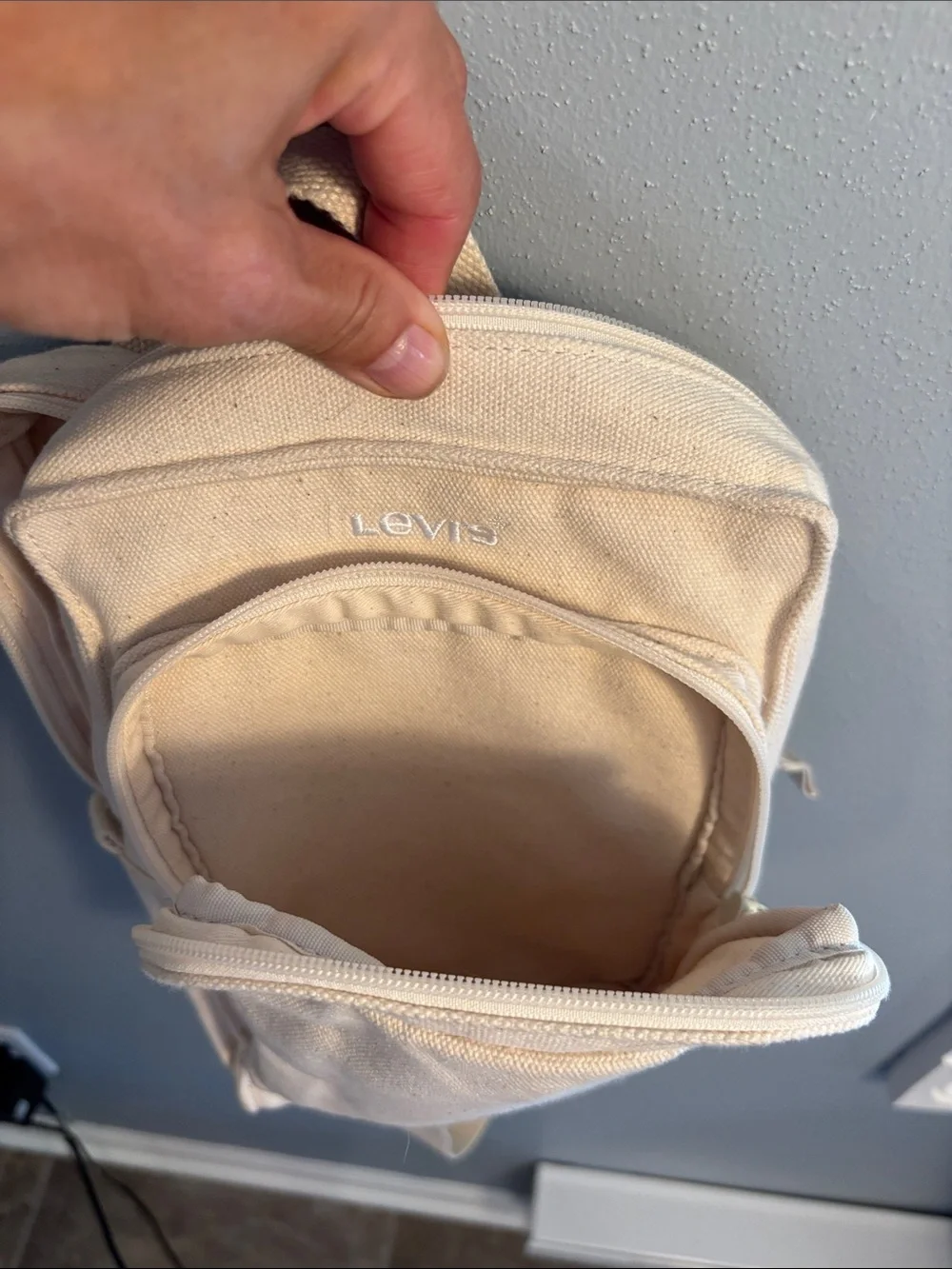 Levi's Cream Canvas Zip Sling Bag